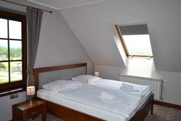 Фото номера Номер с кроватью размера &quot;king-size&quot; и видом на озеро Отель Hotel LOKIS г. Замок Нидзица 7