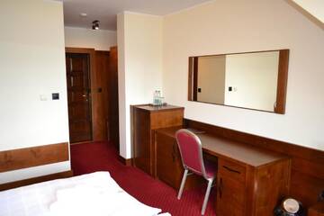 Фото номера Номер с кроватью размера &quot;king-size&quot; и видом на озеро Отель Hotel LOKIS г. Замок Нидзица 5