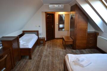 Фото номера Трехместный номер Отель Hotel LOKIS г. Замок Нидзица 7